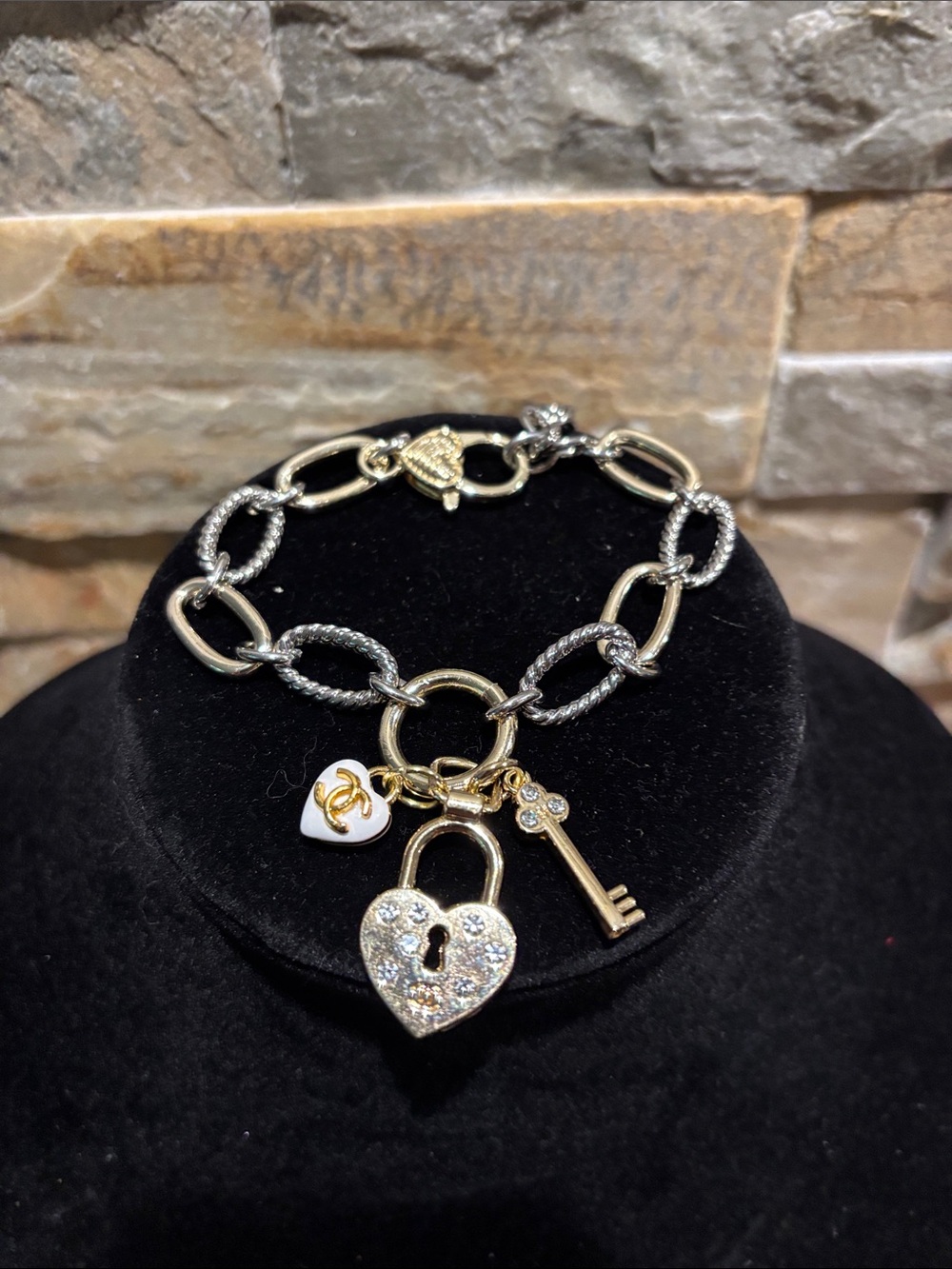 Gold Heart Designer CC Lock & Key Charm on a mixed metal chunky bracelet